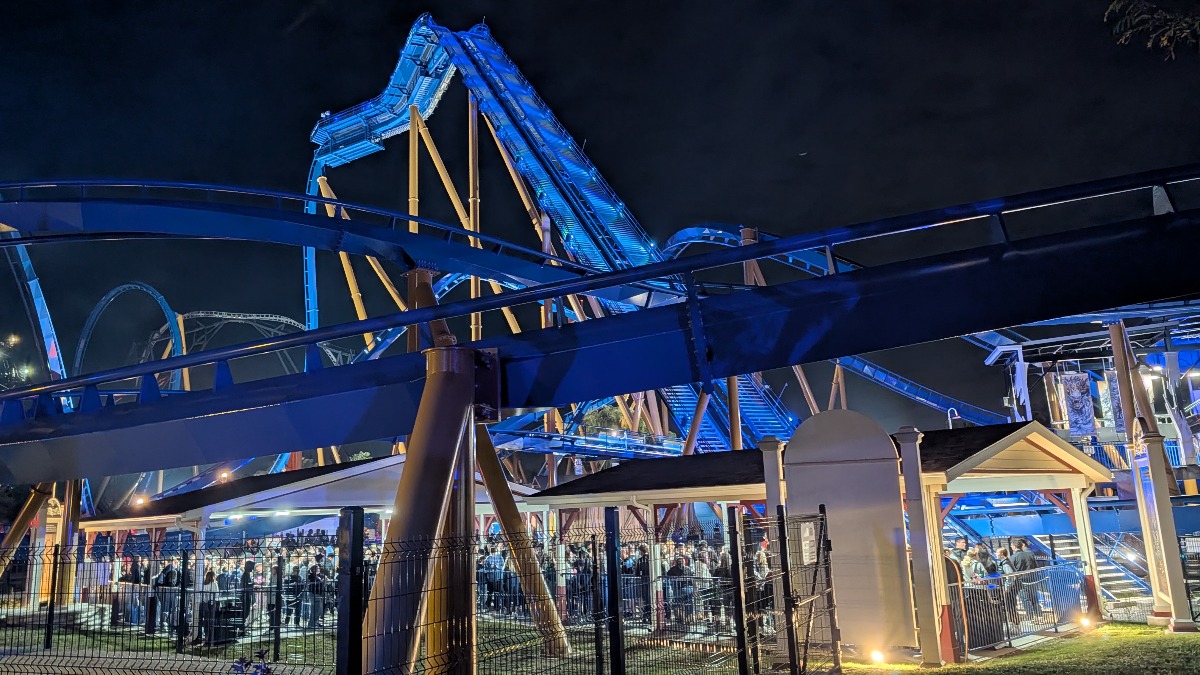 Blue Rollercoaster stands tall against the night sky