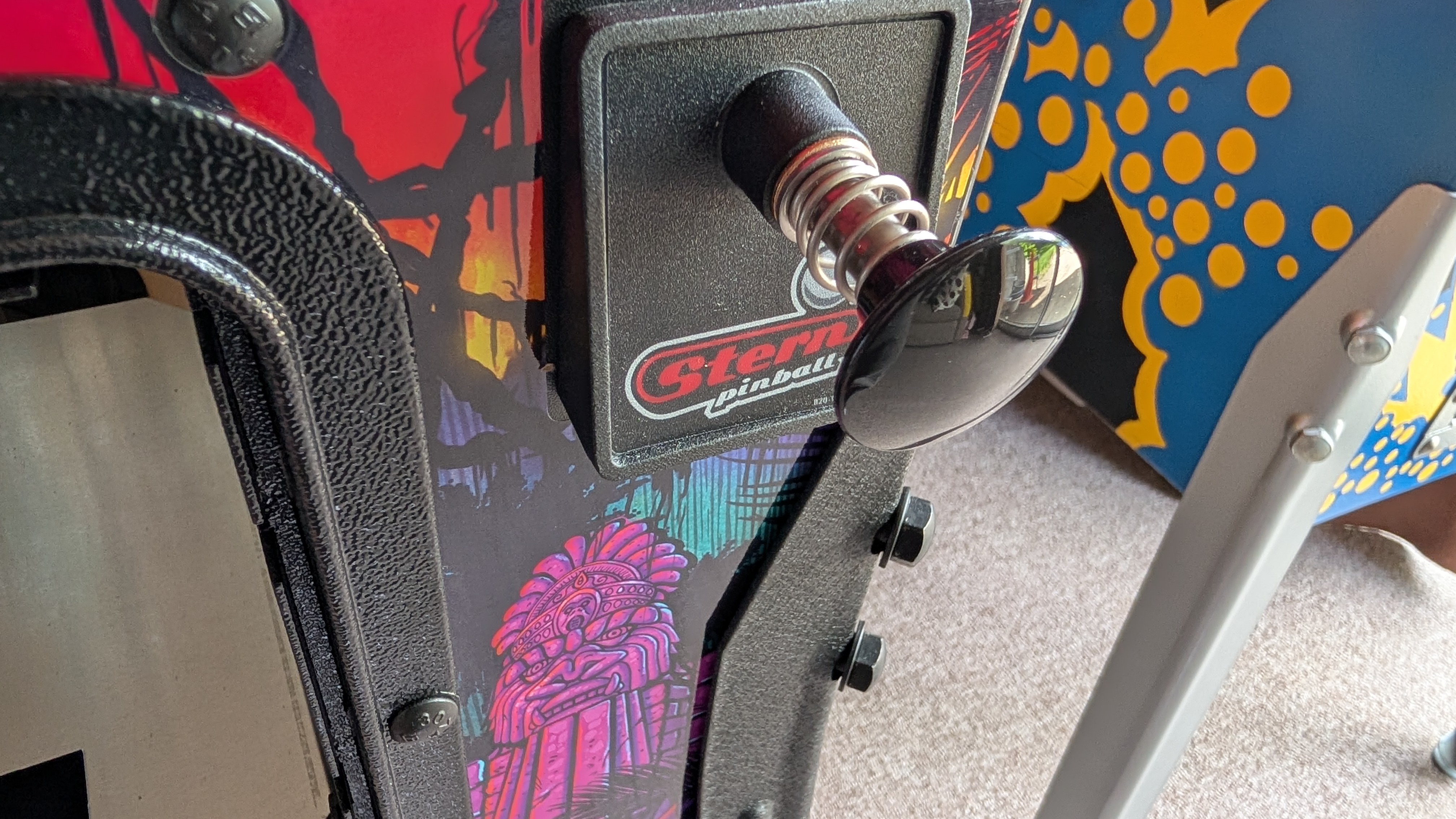 A close up of a pinball machine ball plunger from King Kong Myth of Terror Island
